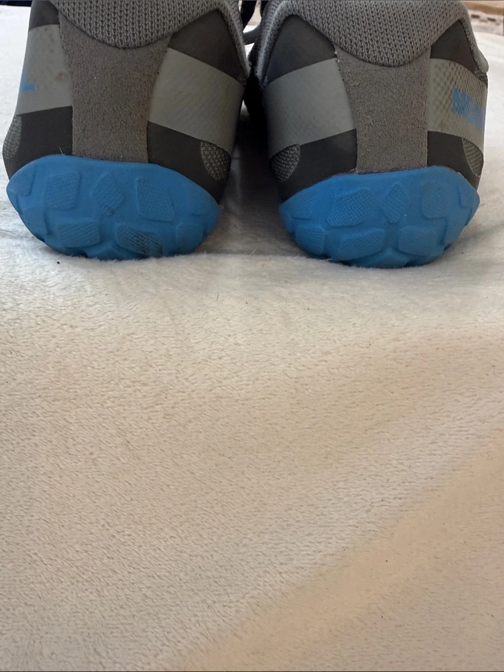 Merrell Barefoot Multi-Gray Camouflage Sneakers with blue accents.